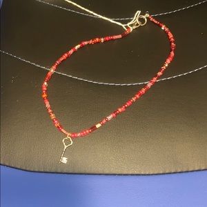 - New handmade red beaded key necklace delicate